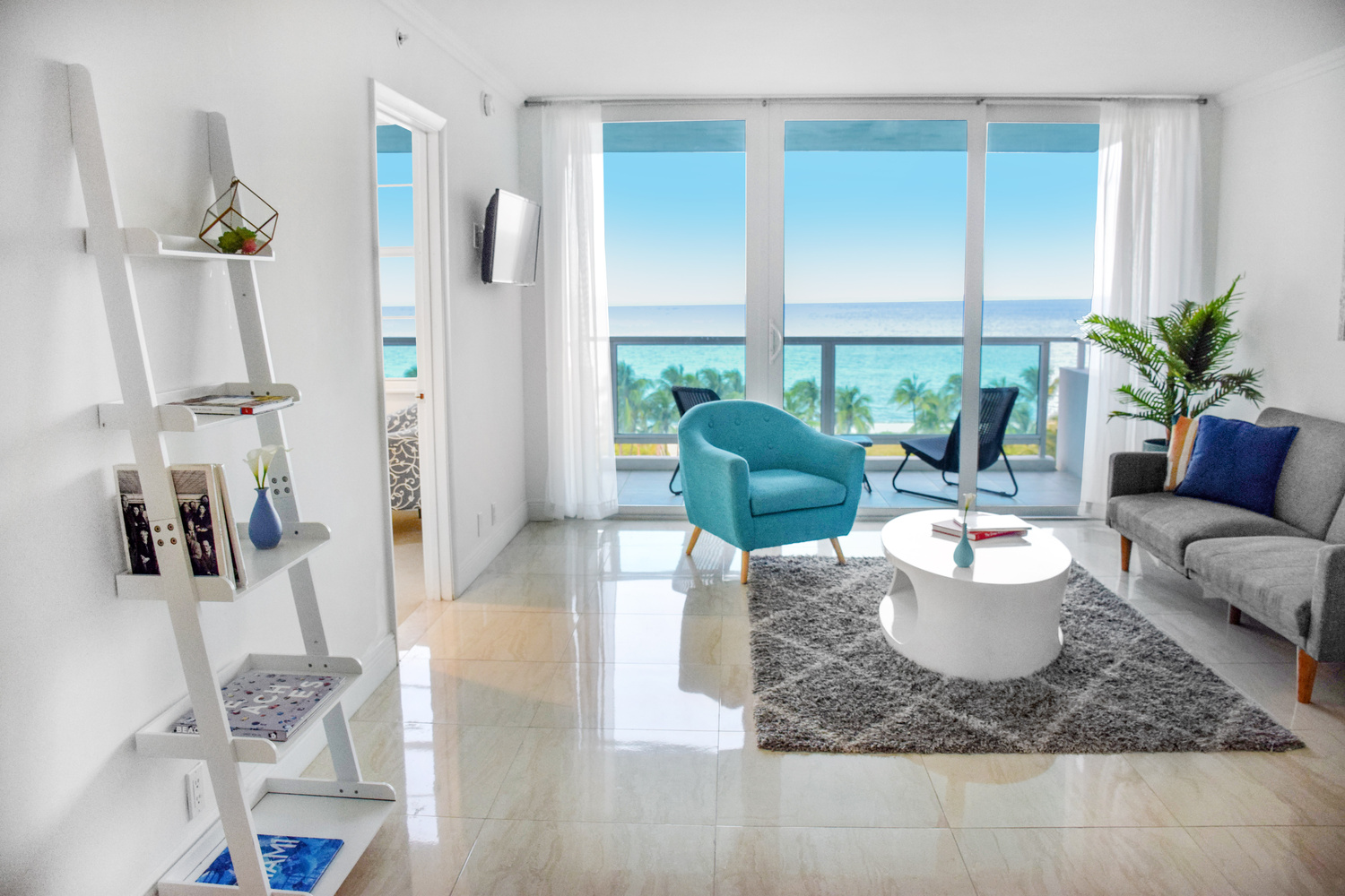 Stylish modern sea view living room in summer beach apartment